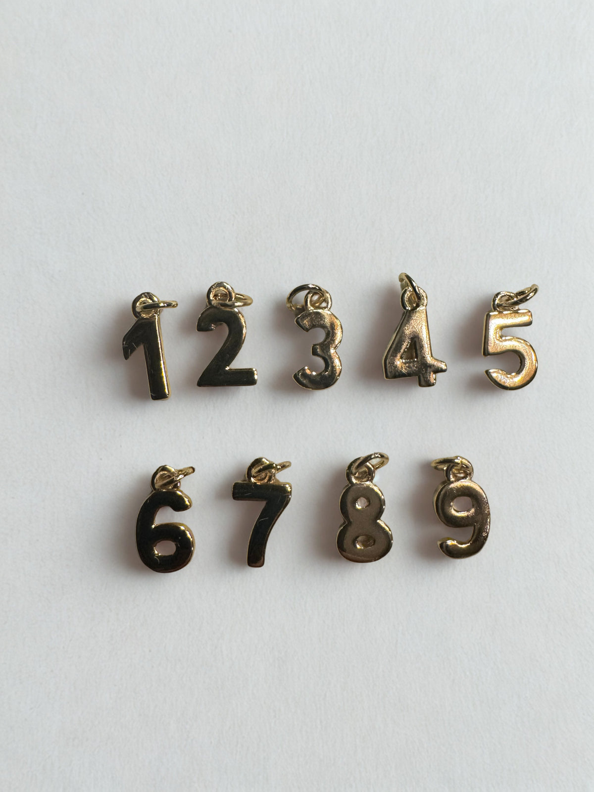 # 1-9 Gold Charms