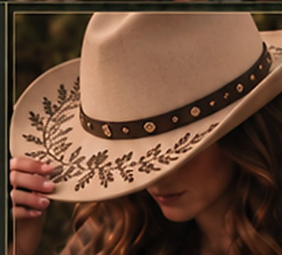 Laser engraved cowboy hat with a plain crown and engraving only on the brim