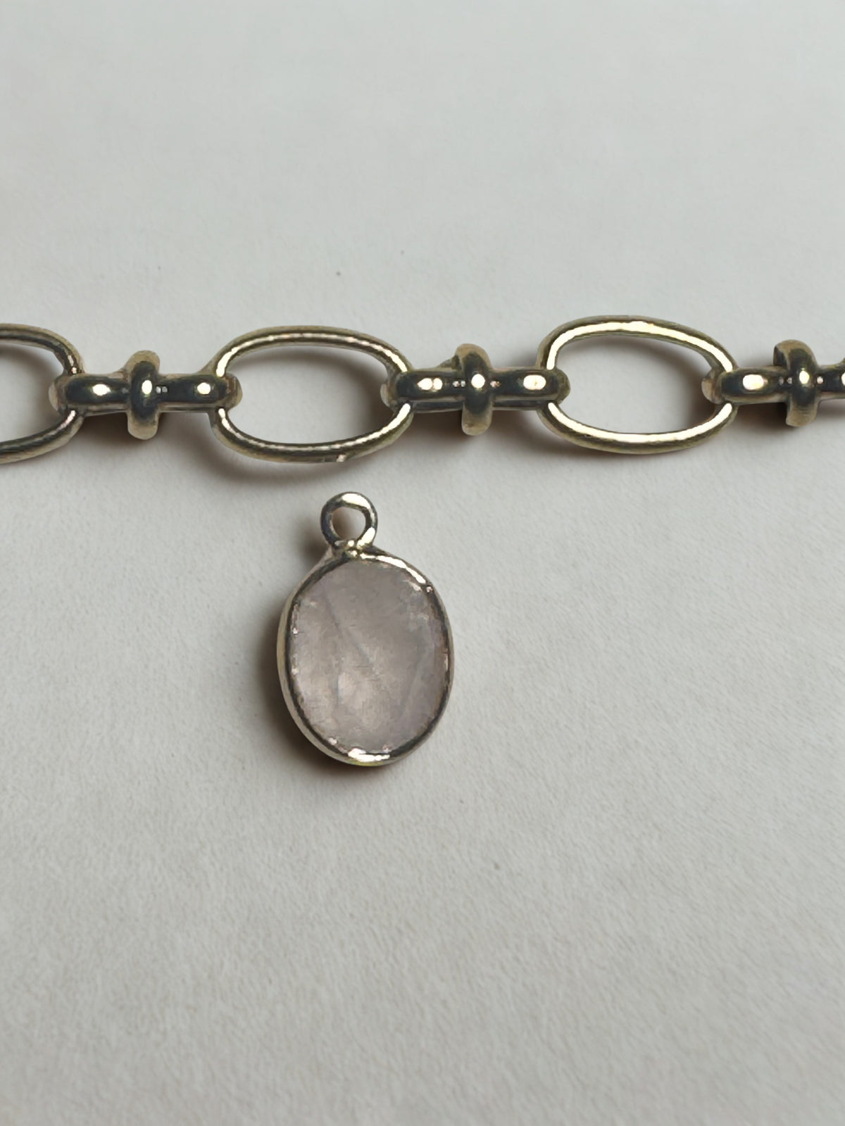 Gold Oval flat Pearl Charm